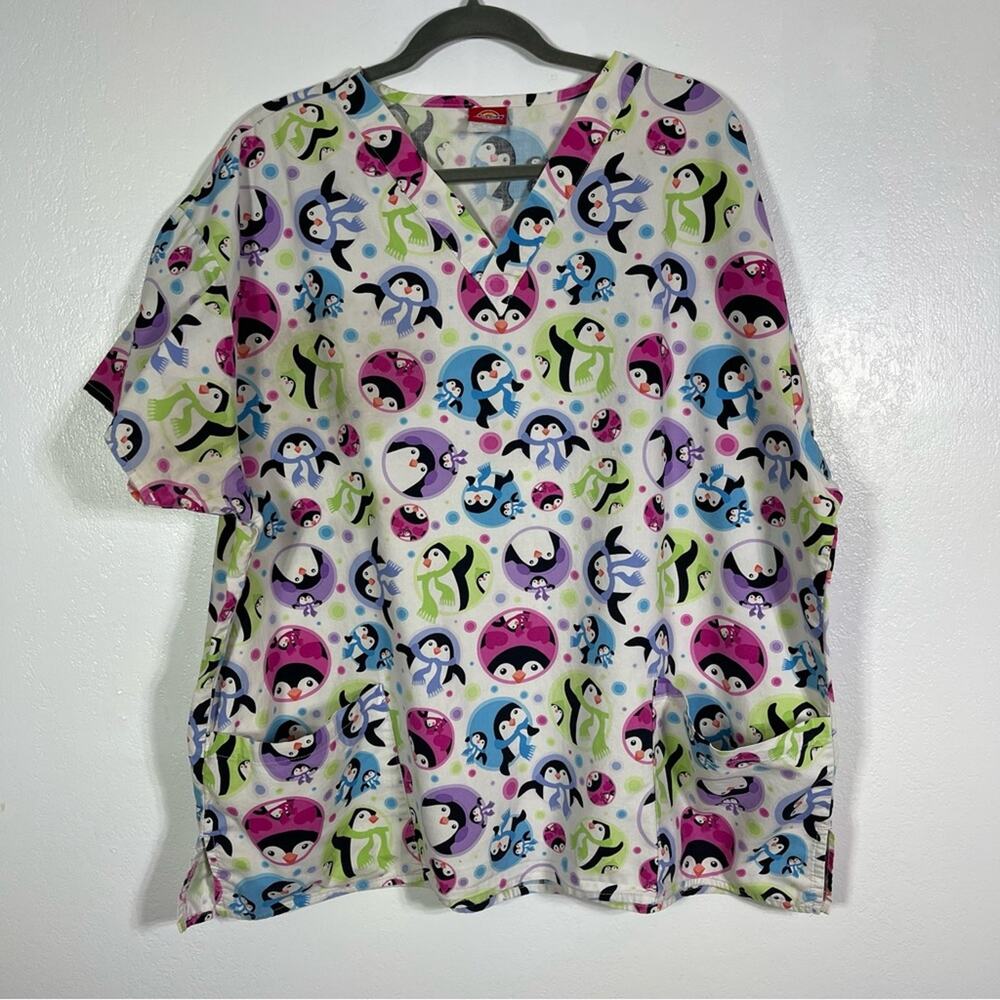 Dickies, Winter Penguin Scrub Top. Measures similar to a 3X Excellent condition!